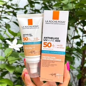 สีเนื้อ หลอดแถบฟ้า - La Roche Posay Anthelios Uvmune 400 Ultra Hydrating Tinted Cream SPF50 ขนาด 50ml.