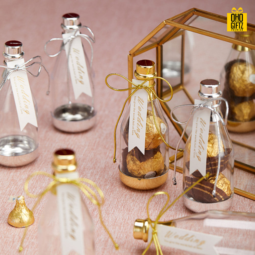 ขวดใส่ขนมพลาสติก พิมพ์สติกเกอร์ชื่อฟรี ทำเป็นของพรีเมี่ยม ของชำร่วยงานเเต่งงานได้